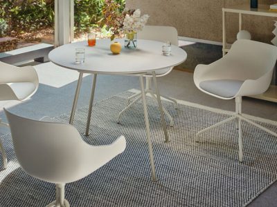 BALTIC Remix Swivel chair, coloured metal legs and plastic shell with cushion.