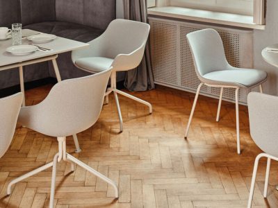 BALTIC Classic Swivel chair, coloured metal legs, upholstered shell with cushion